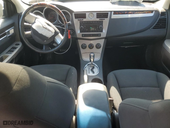 2010 Chrysler Sebring Limited with VIN 1C3CC5FB8AN212308, listed as a Copart auction lot 75617154 with 136,629 mi miles and Salvage Title. Bid and sale history available at carsss.com. Image 8.