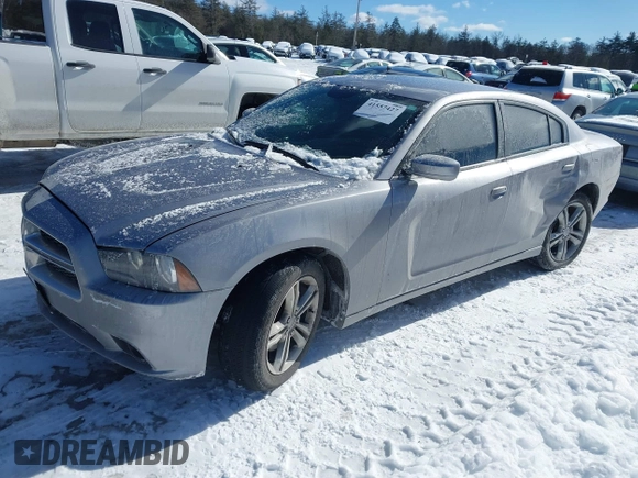 2014 Dodge Charger SXT with VIN 2C3CDXJG2EH135638, listed as a IAAI auction lot 41557427 with 83,536 mi miles. Bid and sale history available at carsss.com. Image 2.