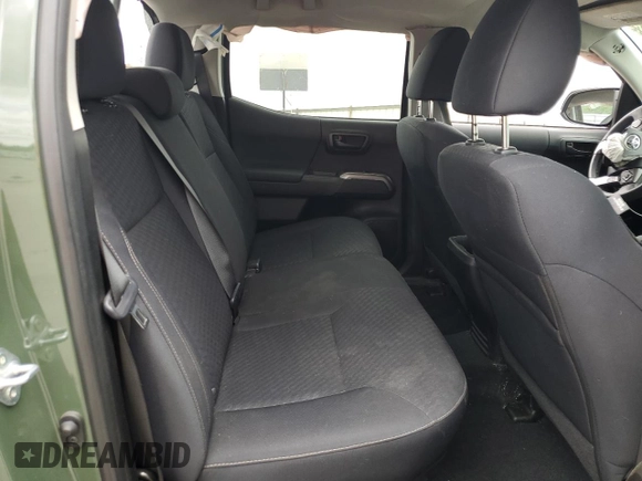 2021 Toyota Tacoma SR z VIN 3TYCZ5AN3MT046066, wystawiony jako Copart lot #54785665 z przebiegiem 57 897 mil mil oraz Szkoda całkowita • Salvage title. Historia ofert i sprzedaży dostępna na DreamBid. Obrazek 10.