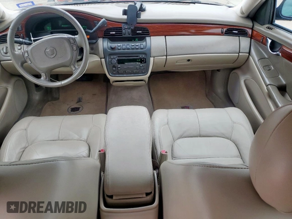 2005 Cadillac DeVille z VIN 1G6KD54Y75U129768, wystawiony jako Copart lot #55890325 z przebiegiem 97 463 mil mil oraz Czysty tytuł • Clean title. Historia ofert i sprzedaży dostępna na DreamBid. Obrazek 8.