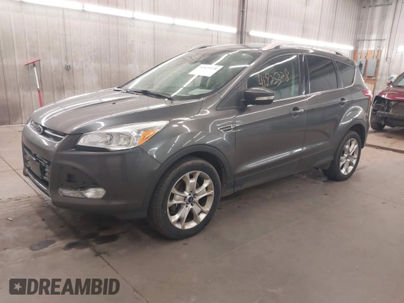2015 Ford Escape Titanium with VIN 1FMCU9J96FUA43337, listed as a IAAI auction lot 41825328 with 149,639 mi miles and . Bid and sale history available at DreamBid. Image 18.