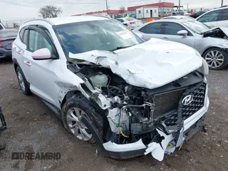 2019 Hyundai Tucson Value z VIN KM8J3CA49KU954400, wystawiony jako IAAI lot #41953230 z przebiegiem 144 930 mil mil oraz . Historia ofert i sprzedaży dostępna na DreamBid. Obrazek 1.