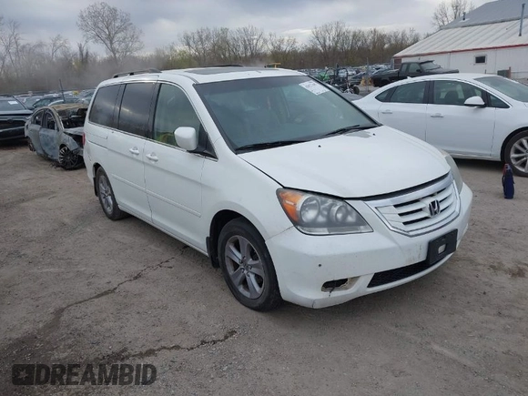 2010 Honda Odyssey Touring with VIN 5FNRL3H99AB005395, listed as a IAAI auction lot 42027445 with 181,559 mi miles. Bid and sale history available at carsss.com. Image 1.