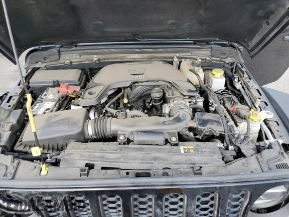 2020 Jeep Gladiator Rubicon z VIN 1C6JJTBG7LL197837, wystawiony jako Copart lot #58169095 z przebiegiem 59 578 mil mil oraz Szkoda całkowita • Salvage title. Historia ofert i sprzedaży dostępna na DreamBid. Obrazek 11.