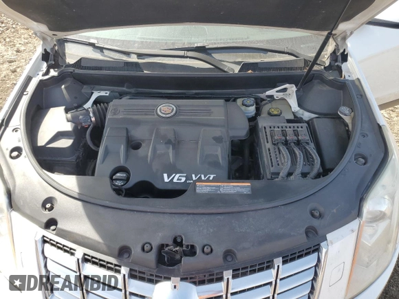 2013 Cadillac SRX Performance Collection z VIN 3GYFNDE35DS585852, wystawiony jako Copart lot #53179435 z przebiegiem 146 814 mil mil oraz Szkoda całkowita • Salvage title. Historia ofert i sprzedaży dostępna na DreamBid. Obrazek 12.