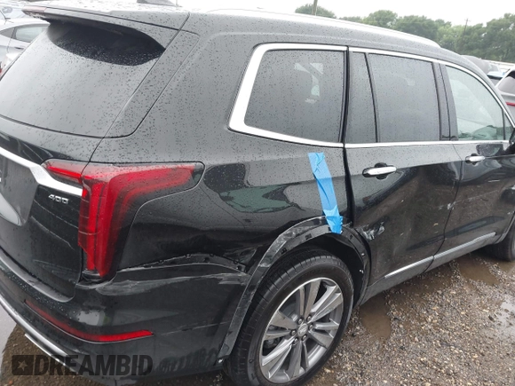 2025 Cadillac XT6 FWD Premium Luxury with VIN 1GYKPCRS3SZ120054, listed as a IAAI auction lot 42166157 with 16,280 mi miles and . Bid and sale history available at DreamBid. Image 18.
