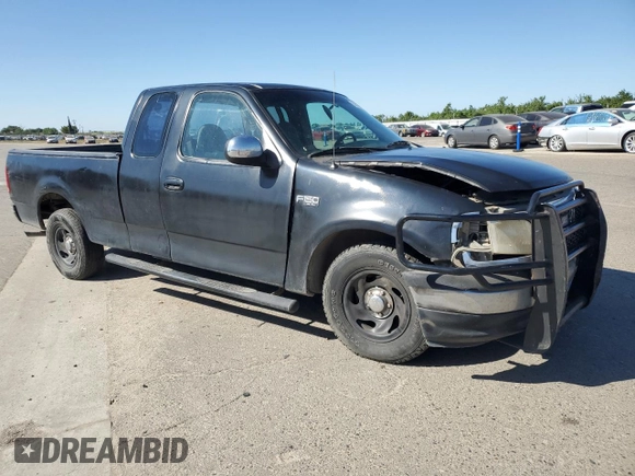 1999 Ford F-150 with VIN 1FTZX1726XKB49687, listed as a Copart auction lot 56416455 with 240,196 mi miles and Salvage title. Bid and sale history available at DreamBid. Image 4.