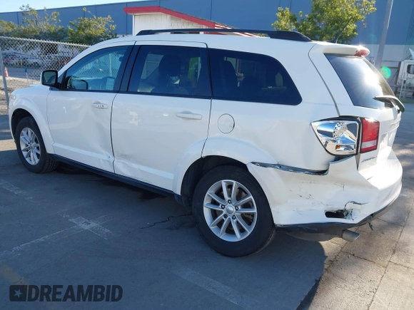 2015 Dodge Journey SXT with VIN 3C4PDCBG8FT673824, listed as a IAAI auction lot 41603661 with 169,939 mi miles and . Bid and sale history available at DreamBid. Image 3.