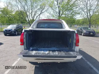 2004 Cadillac Escalade EXT z VIN 3GYEK62N34G304883, wystawiony jako IAAI lot #42149493 z przebiegiem 177 911 mil mil oraz . Historia ofert i sprzedaży dostępna na DreamBid. Obrazek 16.