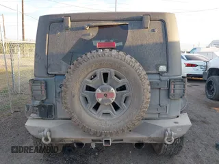 2014 Jeep Wrangler Sport with VIN 1C4AJWAG0EL326774, listed as a IAAI auction lot 41691784 with 98,696 mi miles and . Bid and sale history available at DreamBid. Image 17.
