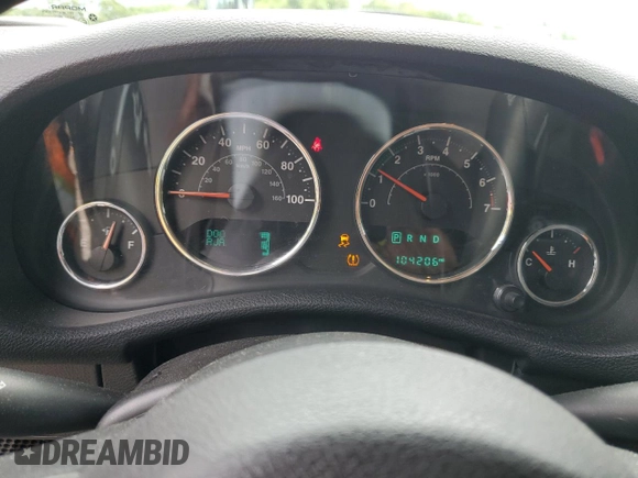 2016 Jeep Wrangler Unlimited Sahara with VIN 1C4BJWEG8GL150249, listed as a Copart auction lot 57574525 with 104,206 mi miles and Salvage title. Bid and sale history available at DreamBid. Image 9.