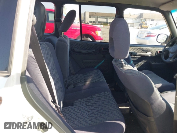 1999 Toyota RAV4 with VIN JT3GP10V2X7064915, listed as a IAAI auction lot 41998544 with 302,351 mi miles and . Bid and sale history available at DreamBid. Image 8.