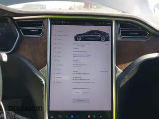 2017 Tesla Model S 100D with VIN 5YJSA1E23HF198592, listed as a IAAI auction lot 41721755 with 127,946 mi miles. Bid and sale history available at carsss.com. Image 19.