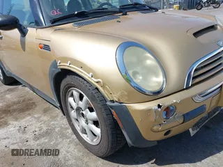 2004 MINI Hardtop with VIN WMWRC33434TJ53276, listed as a IAAI auction lot 42221744 with 195,400 mi miles and . Bid and sale history available at DreamBid. Image 12.