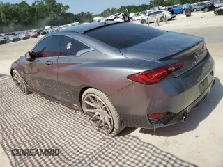 2018 Infiniti Q60 Luxe with VIN JN1EV7EKXJM340831, listed as a Copart auction lot 57178455 with 99,445 mi miles and Salvage title. Bid and sale history available at DreamBid. Image 2.