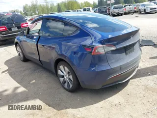 2024 Tesla Model Y Long Range z VIN 7SAYGAEE0RF074822, wystawiony jako IAAI lot #42098821 z przebiegiem Nie podano mil oraz . Historia ofert i sprzedaży dostępna na DreamBid. Obrazek 3.