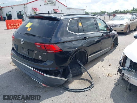 2018 Volkswagen Tiguan SEL with VIN 3VV3B7AX2JM049650, listed as a IAAI auction lot 42169314 with Not Provided miles and . Bid and sale history available at DreamBid. Image 4.