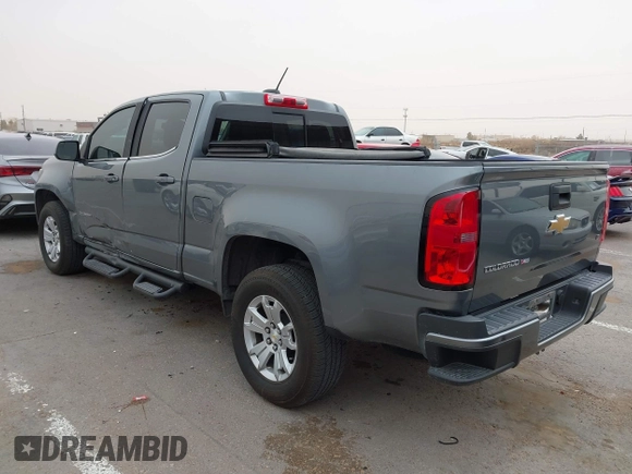 2018 Chevrolet Colorado 2WD LT z VIN 1GCGSCEN0J1223004, wystawiony jako IAAI lot #41782378 z przebiegiem 67 818 mil mil oraz . Historia ofert i sprzedaży dostępna na DreamBid. Obrazek 3.