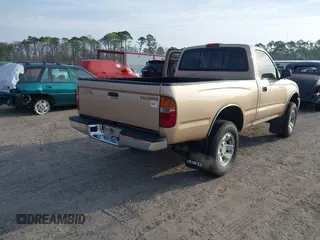 1999 Toyota Tacoma with VIN 4TAPM62NXXZ439318, listed as a IAAI auction lot 41721442 with 299,876 mi miles and . Bid and sale history available at DreamBid. Image 4.
