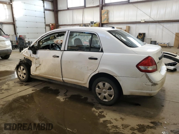 2009 Nissan Versa 1.6 with VIN 3N1CC11E59L477417, listed as a Copart auction lot 88986075 with 0 mi miles and Salvage Title. Bid and sale history available at carsss.com. Image 2.
