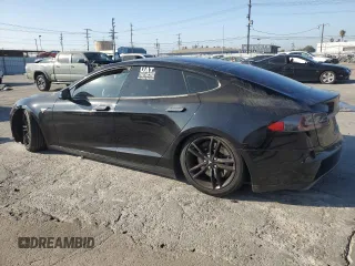 2014 Tesla Model S 60 с VIN 5YJSA1H16EFP40654, выставлен на аукционе Copart как лот 72070974 с пробегом Не указан миль и Списание • Salvage title. История ставок и продаж доступна на DreamBid. Изображение 2.