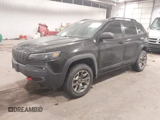 2020 Jeep Cherokee Trailhawk z VIN 1C4PJMBX4LD507364, wystawiony jako IAAI lot #41202333 z przebiegiem 90 000 mil mil oraz . Historia ofert i sprzedaży dostępna na DreamBid. Obrazek 19.