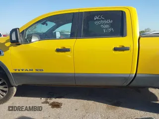 2016 Nissan Titan SL z VIN 1N6BA1F48GN500066, wystawiony jako IAAI lot #41857911 z przebiegiem 133 303 mil mil oraz . Historia ofert i sprzedaży dostępna na DreamBid. Obrazek 14.
