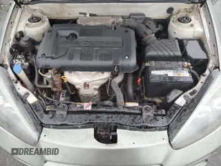 2008 Hyundai Tiburon GS z VIN KMHHM66D18U264820, wystawiony jako Copart lot #54485415 z przebiegiem 158 129 mil mil oraz Szkody całkowita. Historia ofert i sprzedaży dostępna na DreamBid. Obrazek 11.
