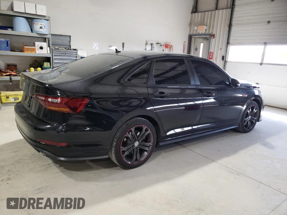 2019 Volkswagen Jetta GLI S z VIN 3VW5T7BU9KM142852, wystawiony jako Copart lot #49419395 z przebiegiem 99 203 mil mil oraz Szkody całkowita. Historia ofert i sprzedaży dostępna na DreamBid. Obrazek 3.