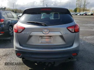 2015 Mazda CX-5 Grand Touring with VIN JM3KE2DY5F0507904, listed as a Copart auction lot 50542895 with 160,736 mi miles and Salvage Title. Bid and sale history available at carsss.com. Image 6.