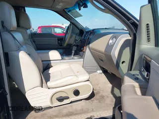 2004 Ford F-150 XL with VIN 1FTPX125X4NB03038, listed as a IAAI auction lot 41555454 with 218,770 mi miles. Bid and sale history available at carsss.com. Image 5.