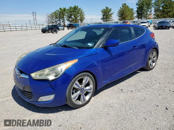 2013 Hyundai Veloster w/Red Int with VIN KMHTC6AD2DU150842, listed as a Copart auction lot 66378455 with 119,901 mi miles and Clean title. Bid and sale history available at DreamBid. Image 1.