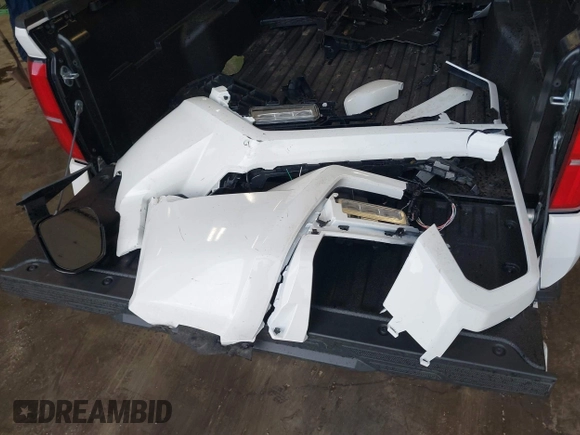 2025 Toyota Tacoma SR with VIN 3TMLB5JN2SM090394, listed as a IAAI auction lot 41916312 with 840 mi miles and . Bid and sale history available at DreamBid. Image 12.