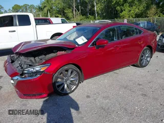 2018 Mazda 6 Grand Touring with VIN JM1GL1TY1J1302146, listed as a IAAI auction lot 41788881 with 55,852 mi miles and . Bid and sale history available at DreamBid. Image 2.
