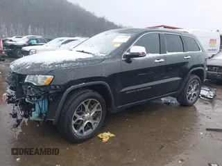 2021 Jeep Grand Cherokee 80th Anniversary with VIN 1C4RJFBG4MC510082, listed as a IAAI auction lot 41072125 with 55,610 mi miles and . Bid and sale history available at DreamBid. Image 18.