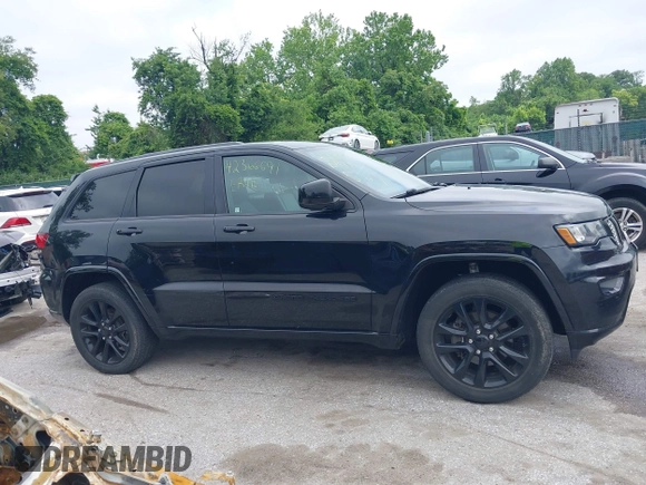 2020 Jeep Grand Cherokee Laredo E with VIN 1C4RJFAG9LC335473, listed as a IAAI auction lot 42366691 with 95,805 mi miles and . Bid and sale history available at DreamBid. Image 13.