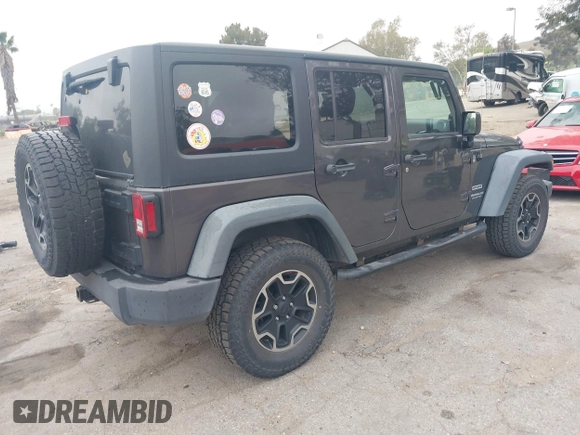 2014 Jeep Wrangler Unlimited Sport with VIN 1C4BJWDG7EL244749, listed as a IAAI auction lot 41871127 with 128,420 mi miles and . Bid and sale history available at DreamBid. Image 4.