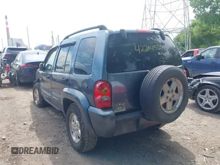 2002 Jeep Liberty Limited z VIN 1J4GL58KX2W339237, wystawiony jako IAAI lot #42284526 z przebiegiem 183 416 mil mil oraz . Historia ofert i sprzedaży dostępna na DreamBid. Obrazek 3.