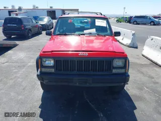 1995 Jeep Cherokee Sport with VIN 1J4FJ68SXSL572608, listed as a IAAI auction lot 42023846 with 167,342 mi miles. Bid and sale history available at carsss.com. Image 6.