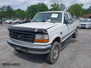 1997 Ford F-250 HD with VIN 1FTHX26F5VEA27372, listed as a IAAI auction lot 42080337 with 263,248 mi miles. Bid and sale history available at carsss.com. Image 2.