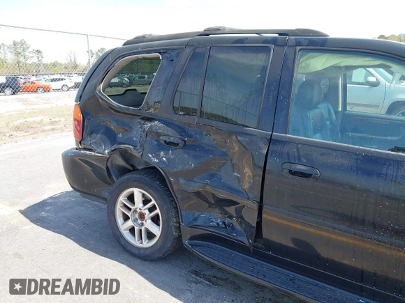 2007 GMC Envoy Denali with VIN 1GKES63MX72103849, listed as a IAAI auction lot 41904190 with 237,261 mi miles. Bid and sale history available at carsss.com. Image 13.