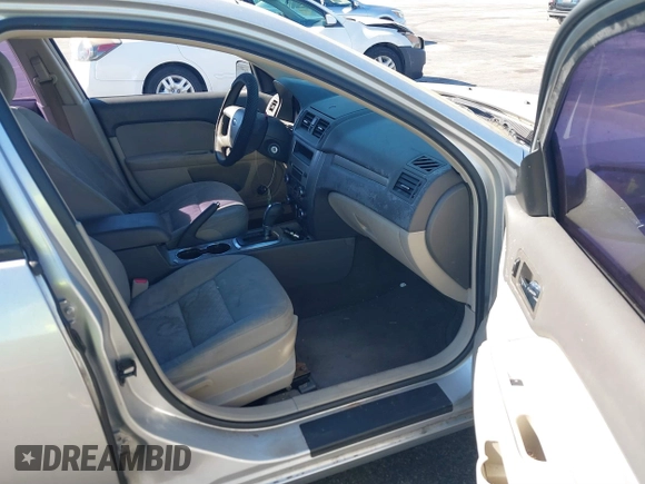 2011 Ford Fusion S with VIN 3FAHP0GA1BR316318, listed as a IAAI auction lot 41824086 with 122,229 mi miles. Bid and sale history available at carsss.com. Image 5.