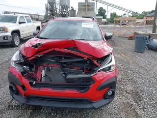2024 Subaru Crosstrek Premium z VIN JF2GUADC1R8287569, wystawiony jako IAAI lot #42495955 z przebiegiem 18 732 mil mil oraz . Historia ofert i sprzedaży dostępna na DreamBid. Obrazek 12.