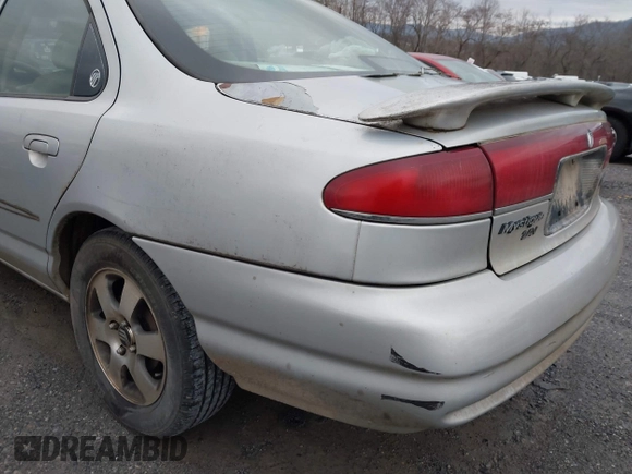 1998 Mercury Mystique z VIN 3MEFM66L2WM611980, wystawiony jako IAAI lot #41391920 z przebiegiem 199 491 mil mil oraz . Historia ofert i sprzedaży dostępna na DreamBid. Obrazek 15.