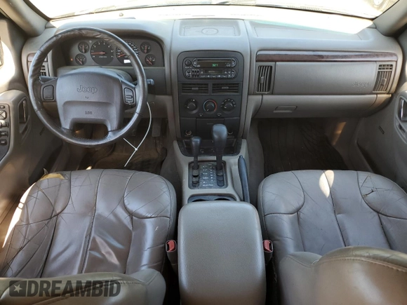 2000 Jeep Grand Cherokee Laredo with VIN 1J4GW48S2YC398116, listed as a Copart auction lot 61828385 with 251,791 mi miles and Clean title. Bid and sale history available at DreamBid. Image 8.