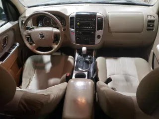 2007 Mercury Mariner Luxury with VIN 4M2CU91147KJ00348, listed as a Copart auction lot 89218185 with 184,182 mi miles and Salvage Title. Bid and sale history available at carsss.com. Image 8.