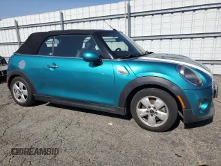 2019 MINI Convertible Cooper z VIN WMWWG5C50K3F79700, wystawiony jako Copart lot #45647955 z przebiegiem 65 168 mil mil oraz Szkoda całkowita • Salvage title. Historia ofert i sprzedaży dostępna na DreamBid. Obrazek 4.