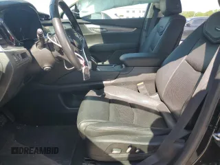 2019 Cadillac XT5 Premium Luxury FWD z VIN 1GYKNERS1KZ284355, wystawiony jako Copart lot #54150405 z przebiegiem 50 001 mil mil oraz Szkody całkowita. Historia ofert i sprzedaży dostępna na DreamBid. Obrazek 7.