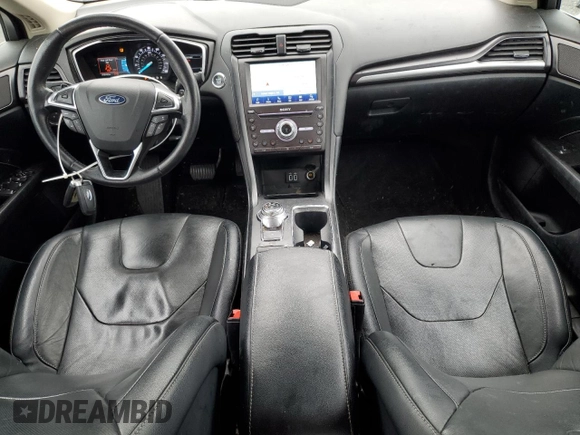 2019 Ford Fusion Titanium with VIN 3FA6P0D99KR242616, listed as a Copart auction lot 57525635 with 79,518 mi miles and Salvage title. Bid and sale history available at DreamBid. Image 8.