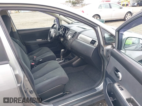2012 Nissan Versa S with VIN 3N1BC1CP1CK807948, listed as a IAAI auction lot 41772063 with 87,126 mi miles. Bid and sale history available at carsss.com. Image 5.